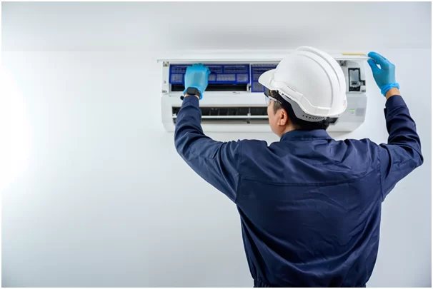 Professional technician working on an appliance