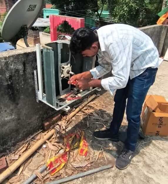 Technician brazing copper lines on commercial AC